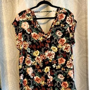 Floral blouse V neck with strap in back.